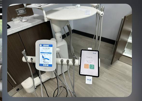 Bien-Air electric delivery unit with iOptima tablet in a dental operatory