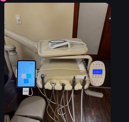 Bien-Air electric delivery unit with iOptima tablet in a dental operatory