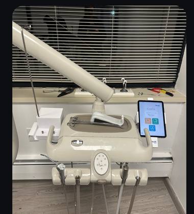 Bien-Air electric delivery unit with iOptima tablet in a dental operatory