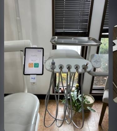 Bien-Air electric delivery unit with iOptima tablet in a dental operatory
