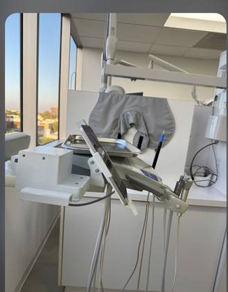 Bien-Air electric delivery unit with iOptima tablet in a dental operatory
