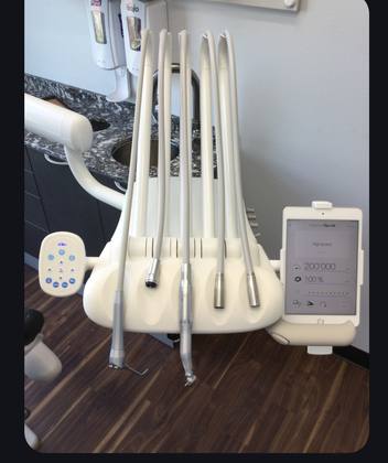 Bien-Air electric delivery unit with iOptima tablet in a dental operatory